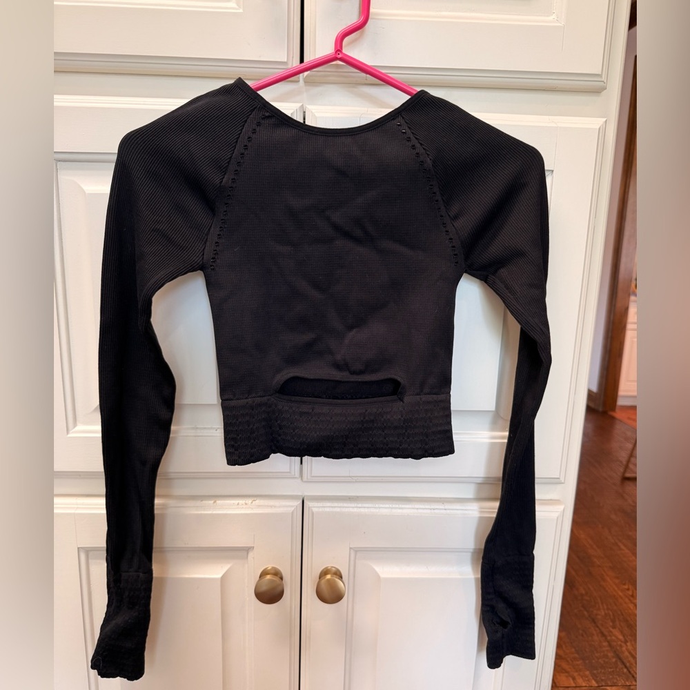 Free People movement black long sleeve top with cut out, size xs/s
